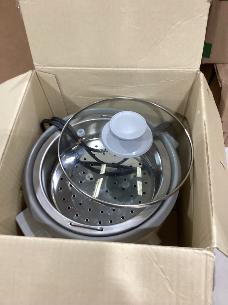 Condition photo showing As Is for Zojirushi 6-Cup Rice Cooker 6 Cup Rice Cooker and Steamer 6 Cup