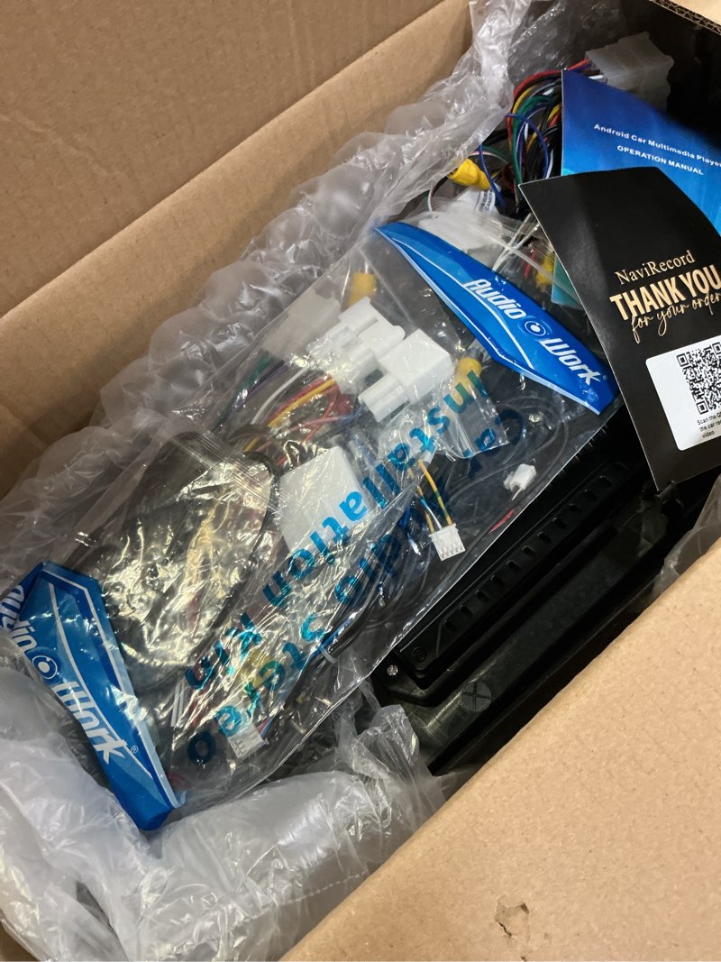 Condition photo showing As Is for 9.7" android 14 car stereo compatible with toyota tacoma 2016-2023, wireless carplay & android auto, 4g+64g, 5g wifi, gps, bluetooth 5.0, retains oem backup cam & steering wheel control & amplifier