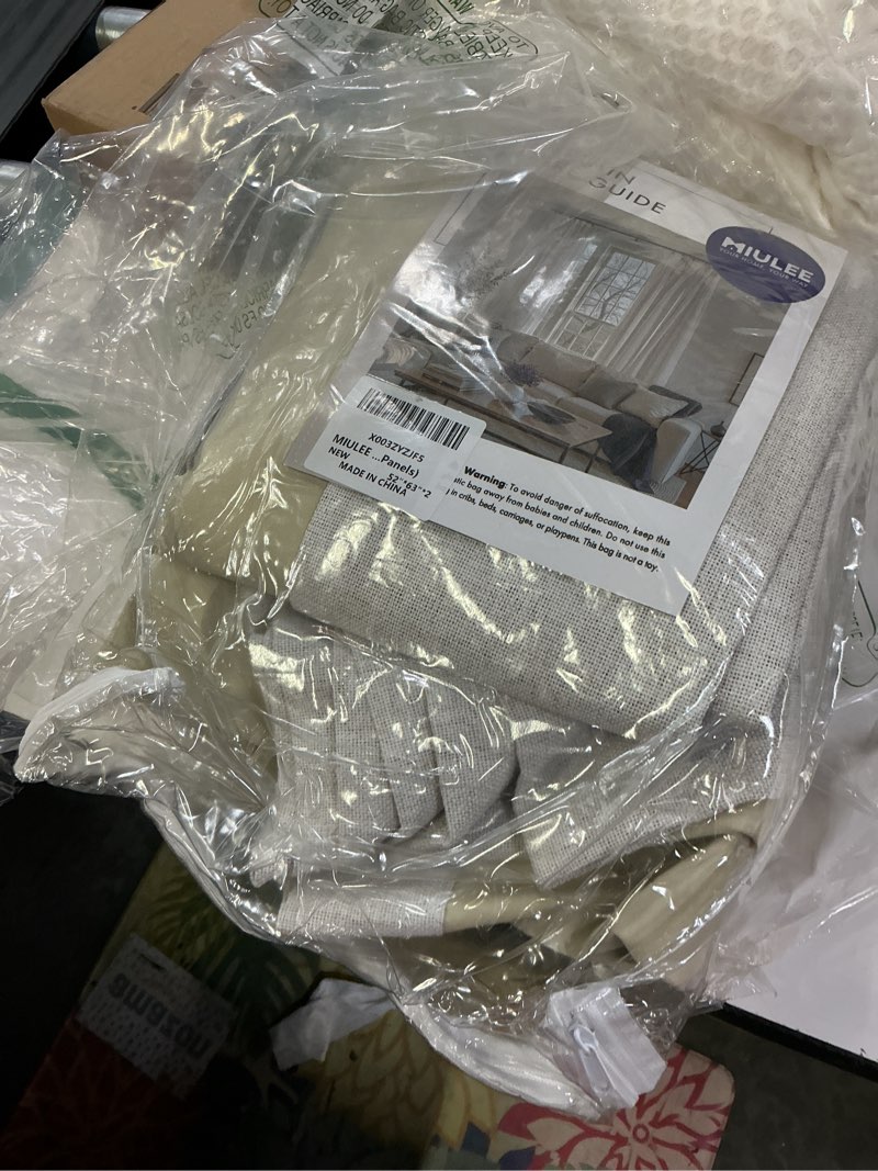 Condition photo showing Good Condition for miulee 100% blackout linen textured curtains for bedroom solid thermal insulated ivory grommet room darkening curtains & drapes luxury decor for living room nursery 52 x 63 inch (2 panels) ivory 52"w x 63"l (pack of 2)