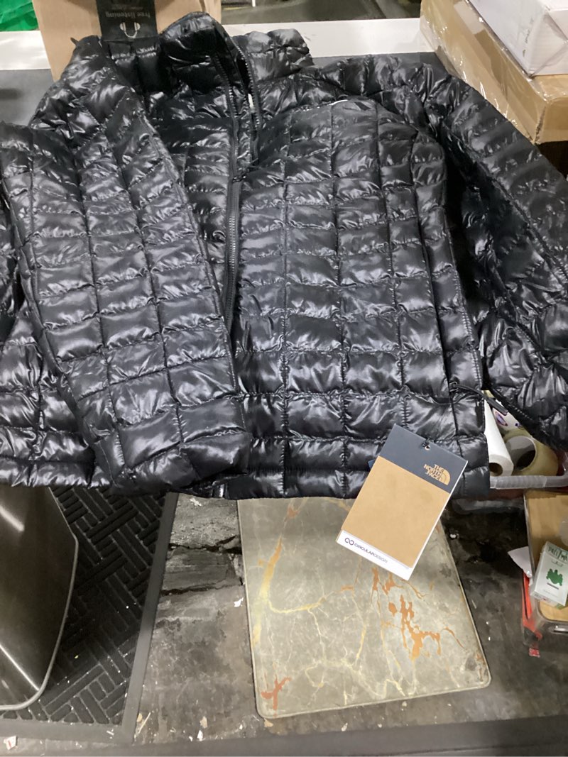Condition photo showing New/Like New for the north face women's thermoball insulated jacket (standard & plus size) | lightweight, zip pockets, wind & water resistant medium tnf black