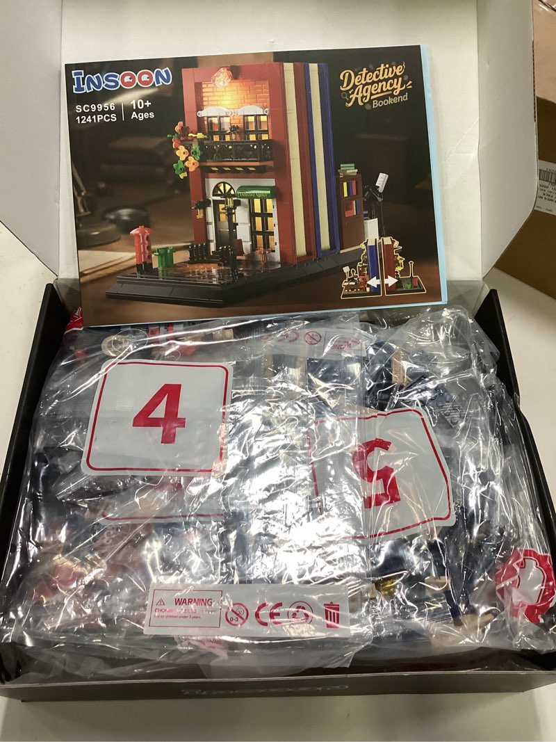 Condition photo showing New/Like New for Detective Bookend Building Set with Lights, 1241 PCS Detective Agency Street House Building Block Kit for Home Decor Bookshelf, Collectible Mystery Bookstand Model for Adults Boys Girls Age 12+
