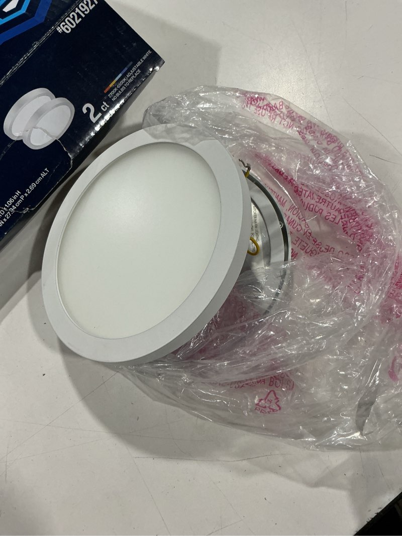 Condition photo showing As Is for project source edge light 1 -light 11-in matte white indoor/outdoor integrated led flush mount light 2 -pack