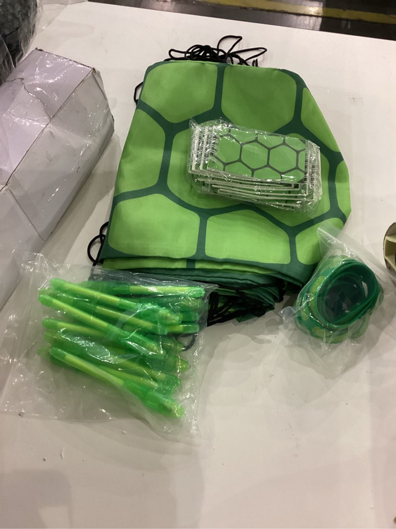 Condition photo showing Good Condition for Green Turtles Party Favors, Ninja Theme Birthday Party Decorations Supplies for Kids, Include Drawstring Bags Notebook Silicone Bracelet Highlighter