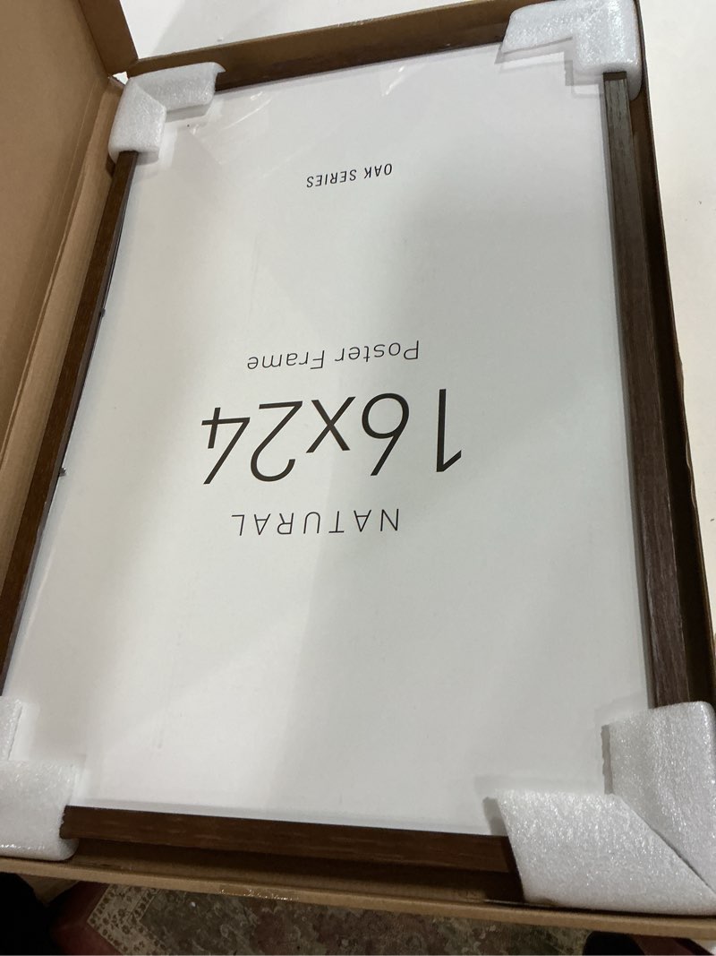 Condition photo showing As Is for Yaetm Minimalist 16x24 Frame - Brown Walnut, Solid Wood 16x24 Poster Frame for Picture & Art Print, Lightweight, Horizontal and Vertical Wall Hanging for Photo Gallery (Single, Walnut) 16x24 - 1 pack Walnut