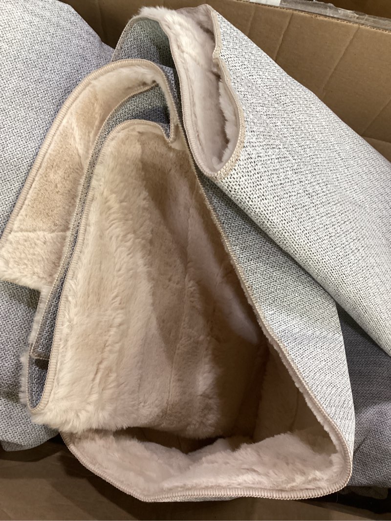 Condition photo showing As Is for light pink area rug *unsure of size* 