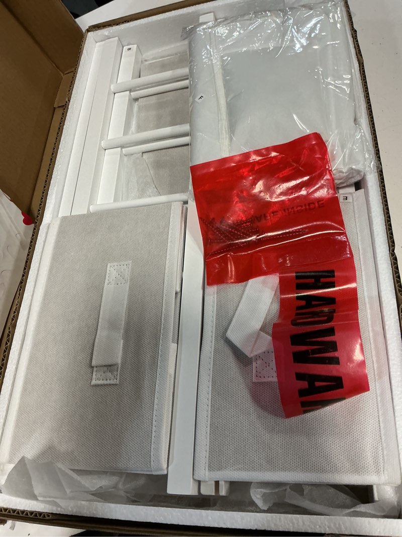 Condition photo showing Good Condition for Badger Basket Wooden Doll Bed with Bed Liner, Pillows and Two Storage Baskets - Fits 18" Dolls - Ideal for Pretend Play and Baby Doll Fun - White/Rose Design with Free Personalization Kit