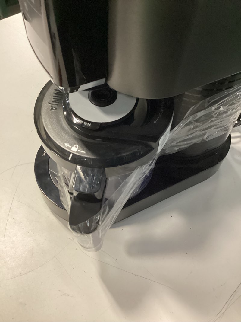 Condition photo showing As Is for broken ninja creami, ice cream maker, ice cream, gelato, sorbet,milkshakes, mix-ins, smoothie bowls & more, 7-in-1, ice cream pints, pint lid, healthy ice cream, compact, perfect for kids, black, nc299amz