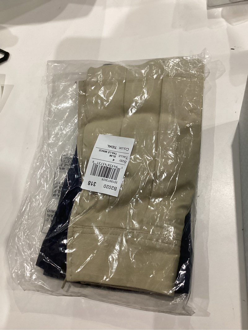 Condition photo showing New/Like New for The Children's Place Girls' Uniform Pleated Skort Slim 4 Slim Sandy/Tidal 2-pack