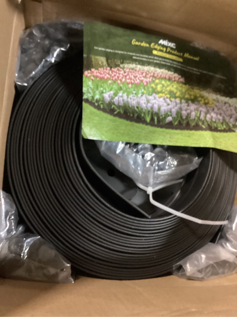 Condition photo showing Good Condition for mixc garden edging border, 100ft 2 inch tall plastic landscape edging with 150 stakes, flexible tool-free lawn border for yard, flower bed & landscaping black 2 inch × 100ft