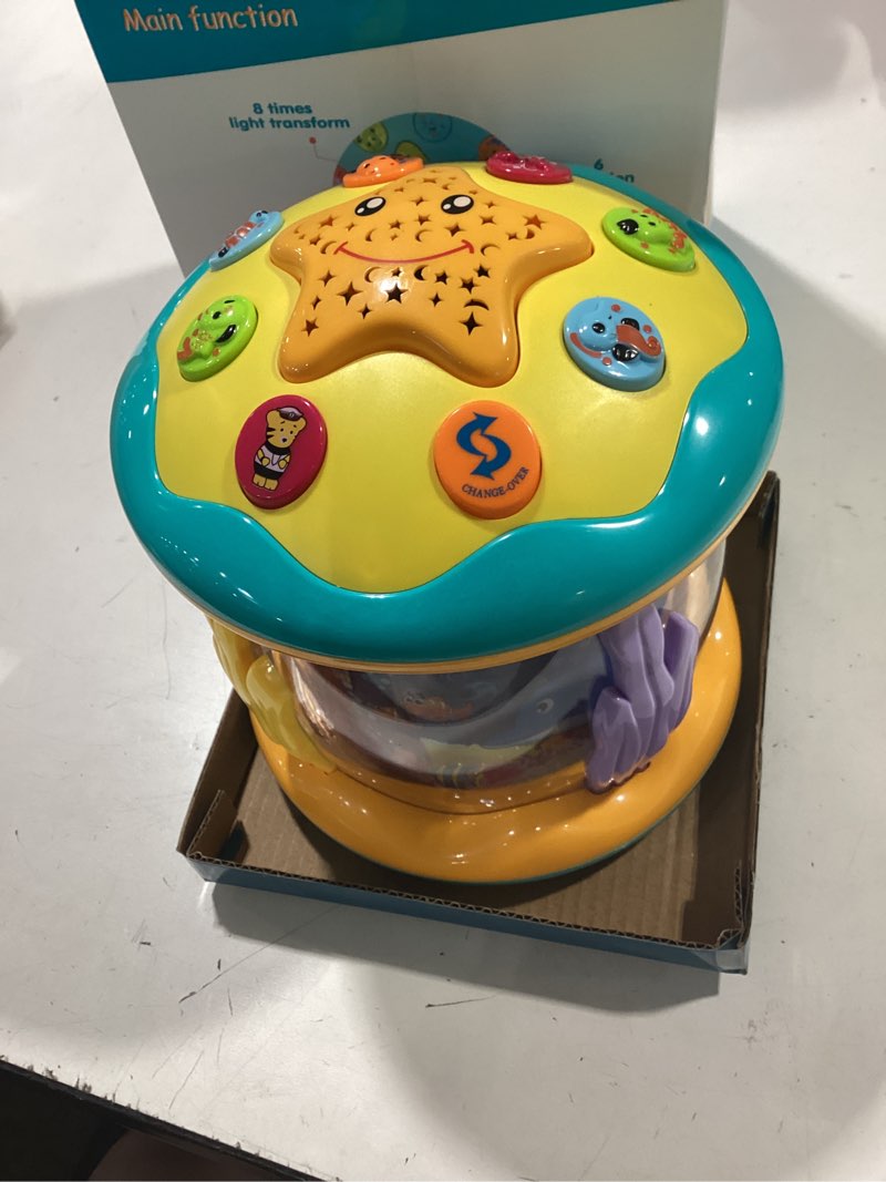 Condition photo showing Good Condition for baby toys 6-12 months ocean projector rotating musical light up tummy time toys for infant 0-6 3-6 months baby aquarium crawling toys 4 5 6 7 8 9 12-18 months boy girl 1 year old birthday shower gifts