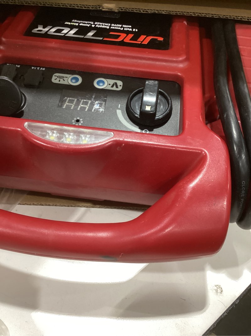 Condition photo showing As Is for clore automotive jump-n-carry jnc770r 1700 peak amp premium 12 volt jump starter - red