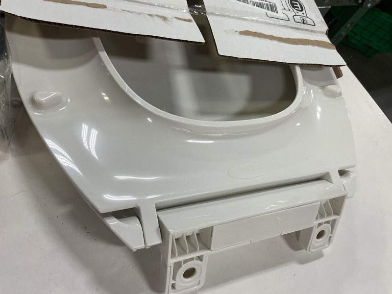 Condition photo showing As Is for KOHLER 4636-RL-0 Cachet ReadyLatch Elongated Toilet Seat Slow Close, Soft Close Toilet Seat Quiet Lid, Contoured Grip-Tight Bumpers Installation Hardware, Apartment Essentials, White White Elongated Ready Latch