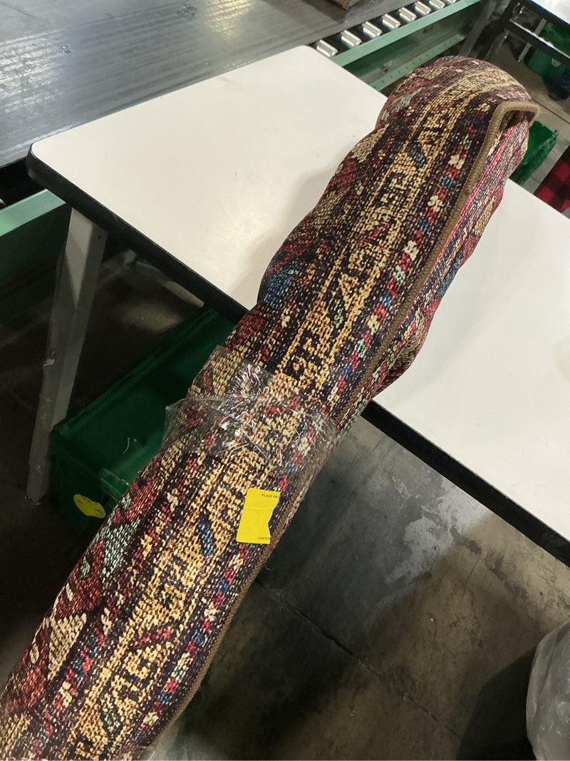 Condition photo showing As Is for momeni karachi polyester rust area rug 6  x 9