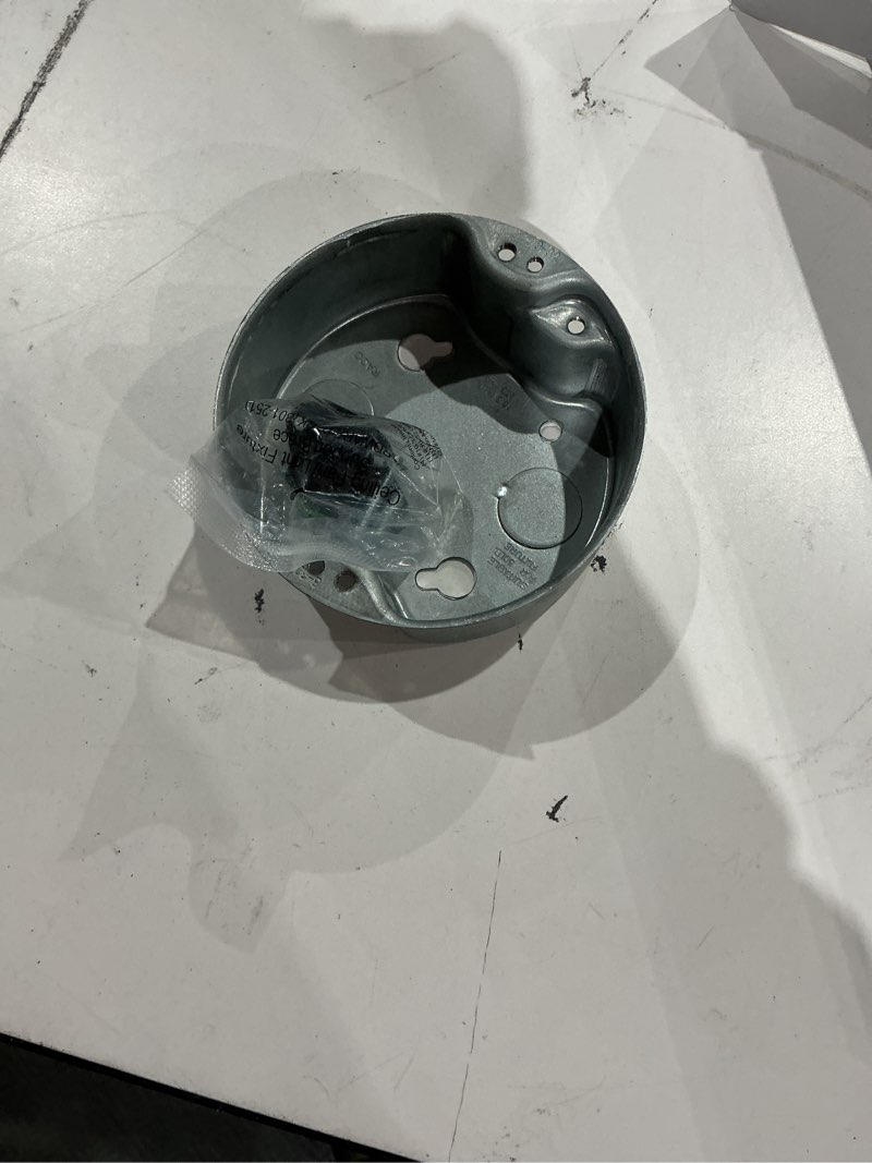 Condition photo showing As Is for hubbell wiring 160680 rnd fan box with ow brkt;1-.5d 936
