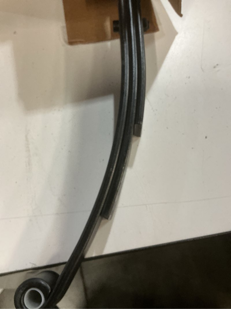 Condition photo showing New/Like New for dorman 929-1012 utility trailer leaf spring, eye/eye, 1 3/4" width, 23 1/8" length, 3 1/2" arch, 3 leaf, 1750lb capacity