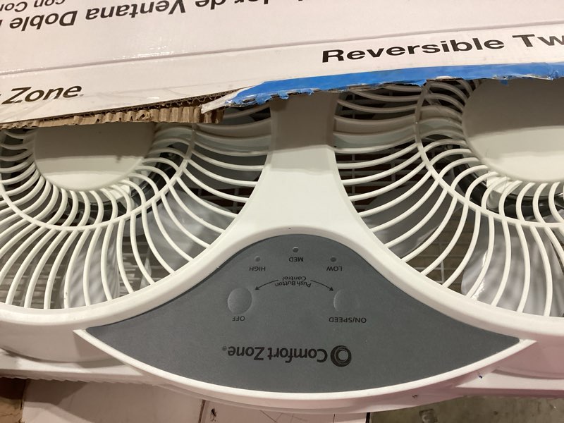 Condition photo showing As Is for comfort zone window fan for bedroom, 9 inch 3 speed dual fans with auto-locking expanders, 3 modes (cool, circulate, exhaust), remote control, fabric cover plus bug screen, white white 9" twin window fan w/ remote