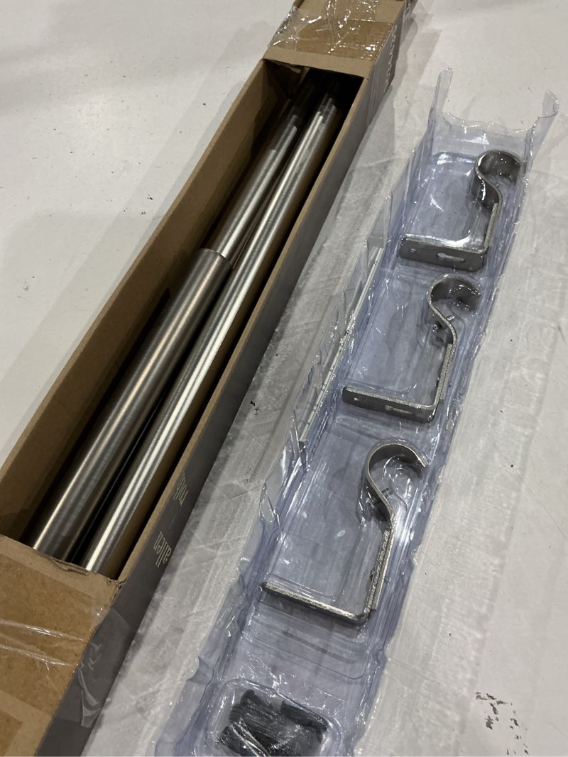 Condition photo showing As Is for allen + roth mix and match 36-in to 72-in brushed nickel steel single curtain rod