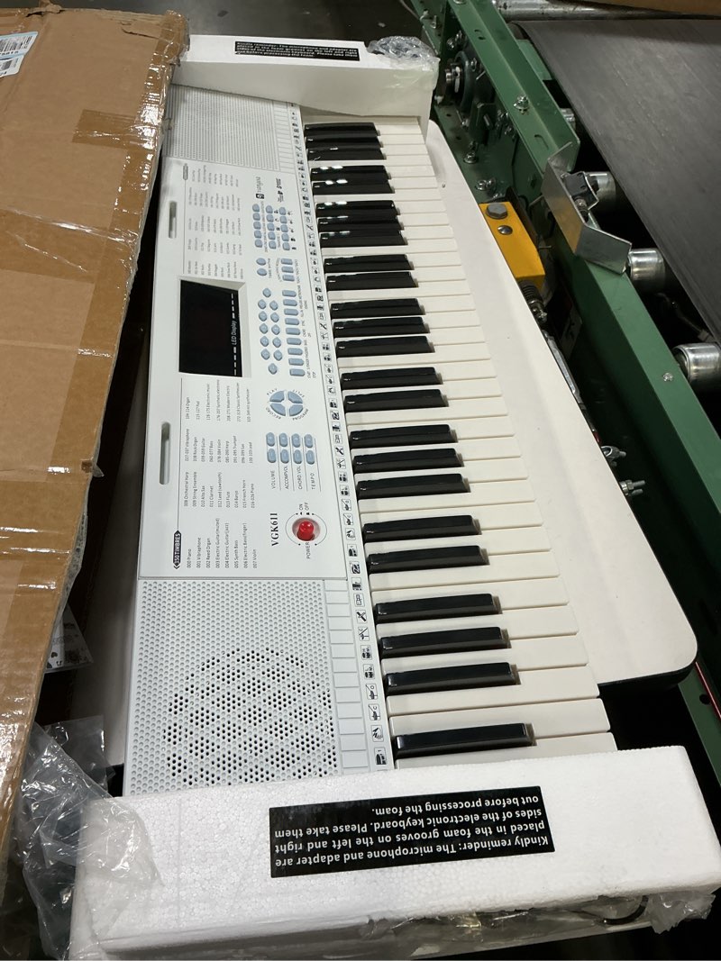 Condition photo showing Good Condition for vangoa vgk611 electric keyboard for beginner, 61 keys portable music keyboard with mini lighted keys, electronic piano for kids, boy, girl, white 61 mini keys white