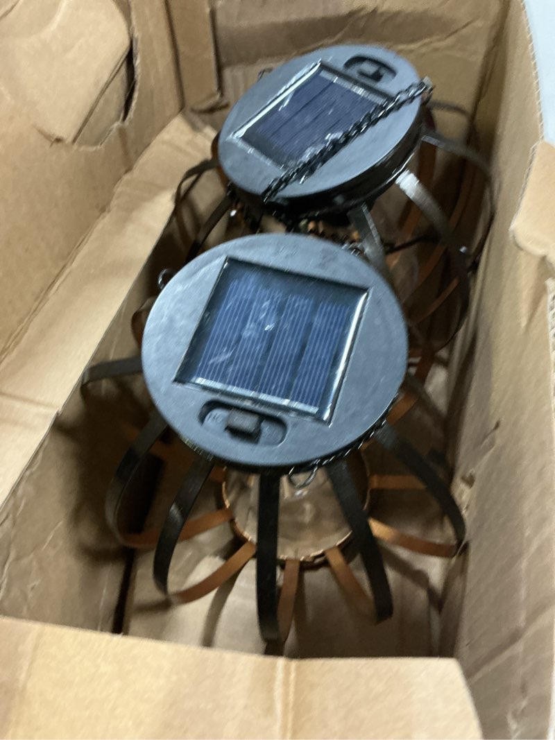 Condition photo showing Good Condition for 2 pack solar lantern lights outdoor, black metal hanging solar lights with hook, waterproof hanging lantern lights for pathway patio yard porch garden decoration (warm white)