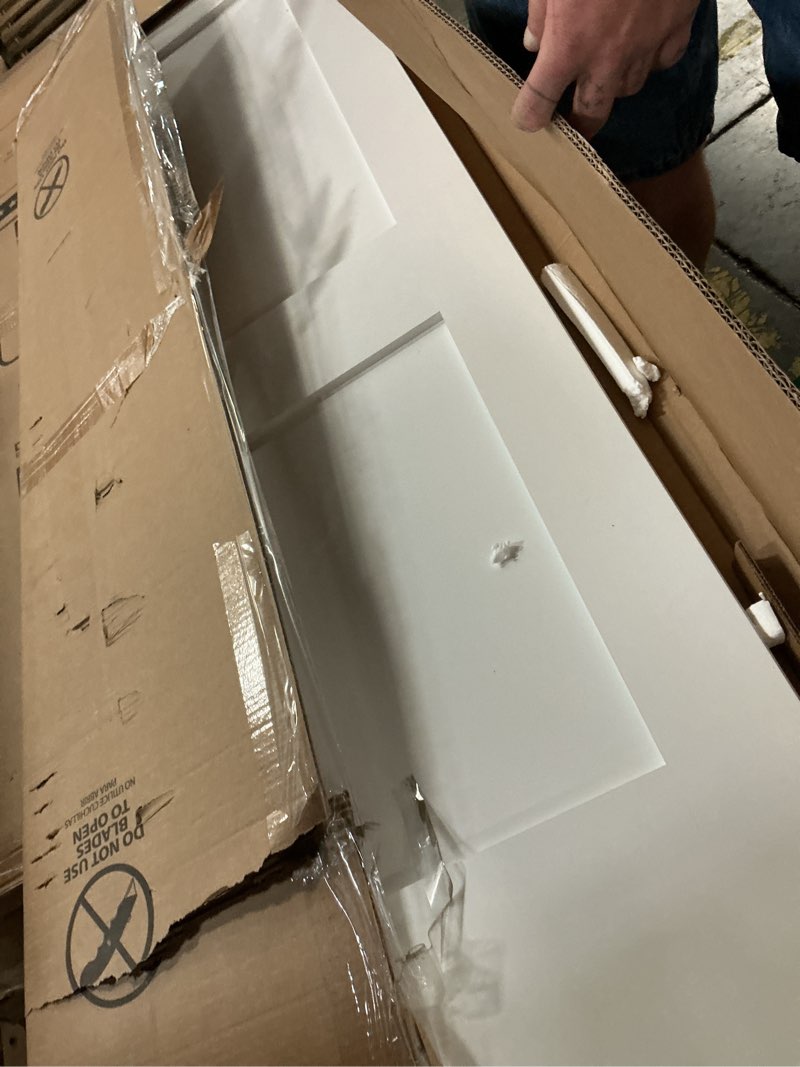 Condition photo showing As Is for 28 in. x 80 in. x 1-3/8 in. shaker white primed 2-panel solid core wood interior slab door