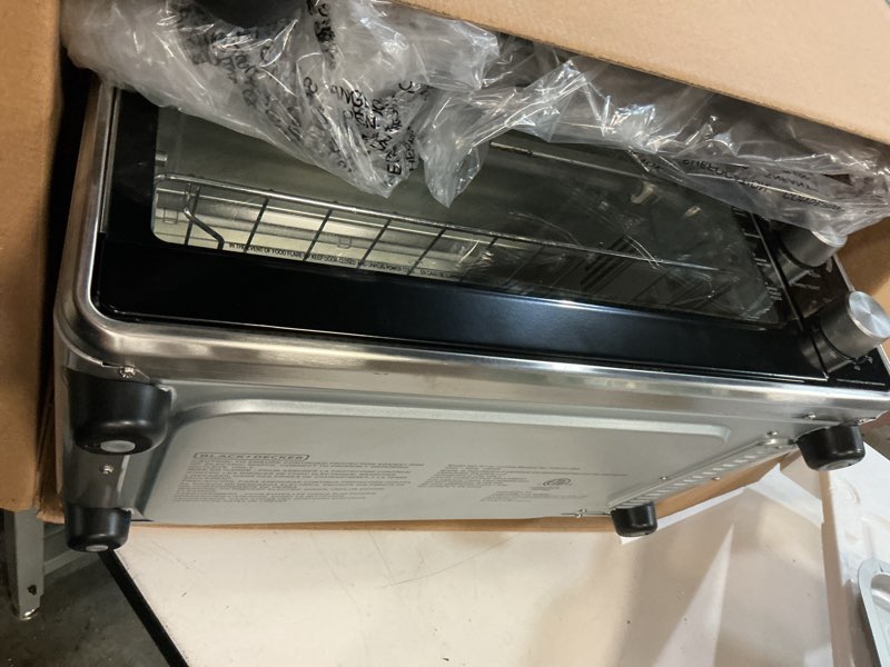 Condition photo showing As Is for black + decker crisp  n bake pro 6-slice air fryer toaster oven with basket  pan  rack & tray  stainless steel