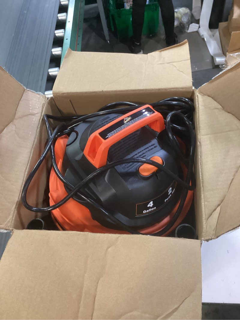 Condition photo showing As Is for armor all vo405p 0901 4 gallon wet/dry vac 2.0 peak hp shop vacuum with nozzles & brush,black/orange 4 gal vac