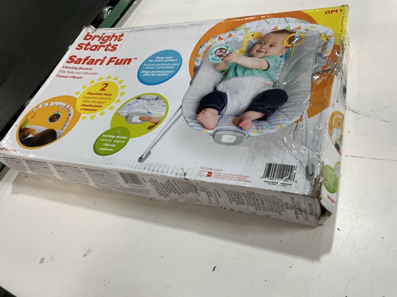 Condition photo showing New/Like New for bright starts baby bouncer soothing vibrations infant seat - removable -toy bar, nonslip feet, 0-6 months up to 20 lbs (safari fun)
