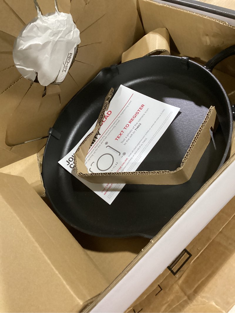 Condition photo showing Good Condition for all-clad cast iron skillet - 12” enameled cast iron pan with lid, enamel coating, grill, oven safe up to 650°f & compatible with all stovetops (gas, electric & induction), easy-clean frying pan, black 12 inch skillet w/ lid
