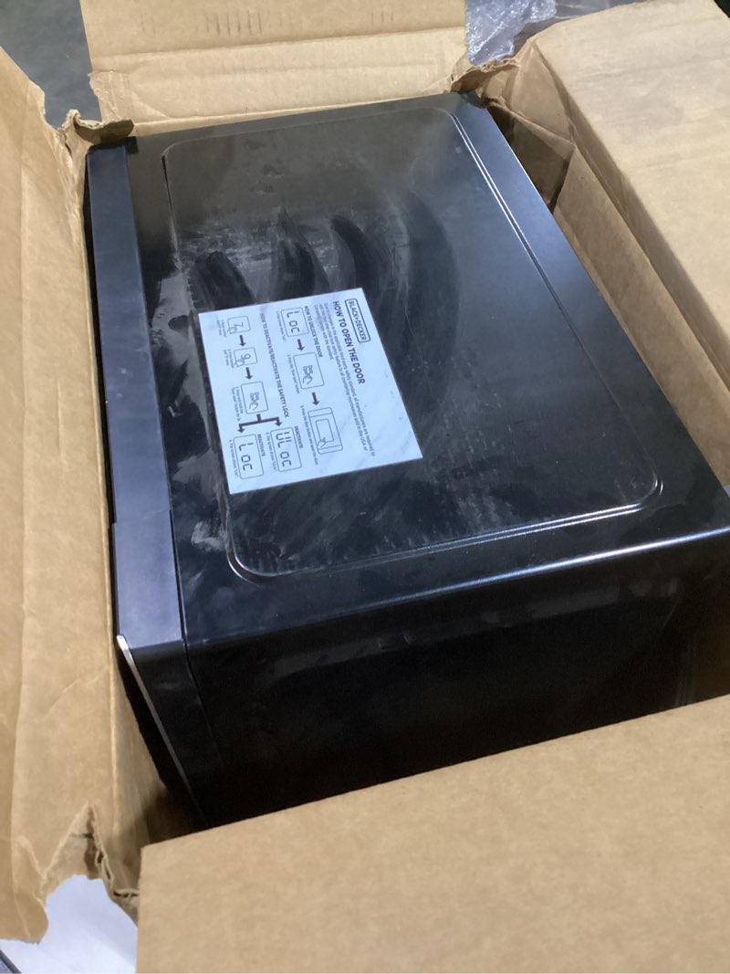 Condition photo showing As Is for BLACK+DECKER Digital Microwave Oven with Turntable Push-Button Door, Child Safety Lock, Stainless Steel, 0.9 Cu Ft 0.9 Cu.Ft