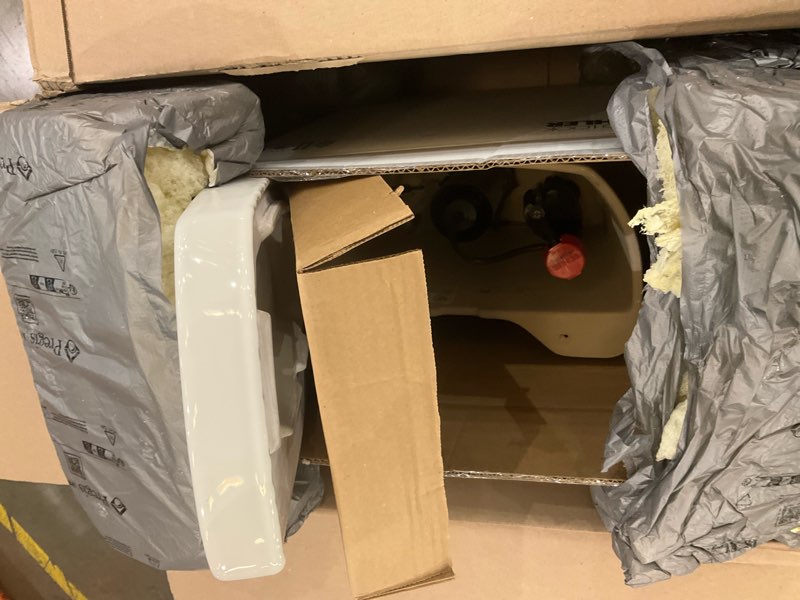 Condition photo showing As Is for Kohler KOH3948-RA-0 1.28 GPF Two-Piece Elongated Toilet with 14" Rough In and Right Hand Trip Lever 