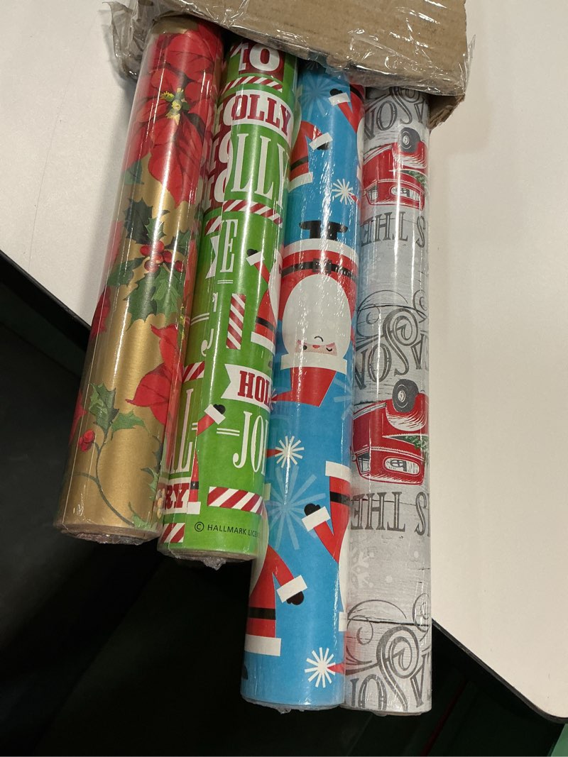 Condition photo showing New/Like New for (Similar to photo)Hallmark Reversible Quad Pack Wrapping Paper (Santa & Trees, 4 Gift Wrap Rolls) Santa and Trees