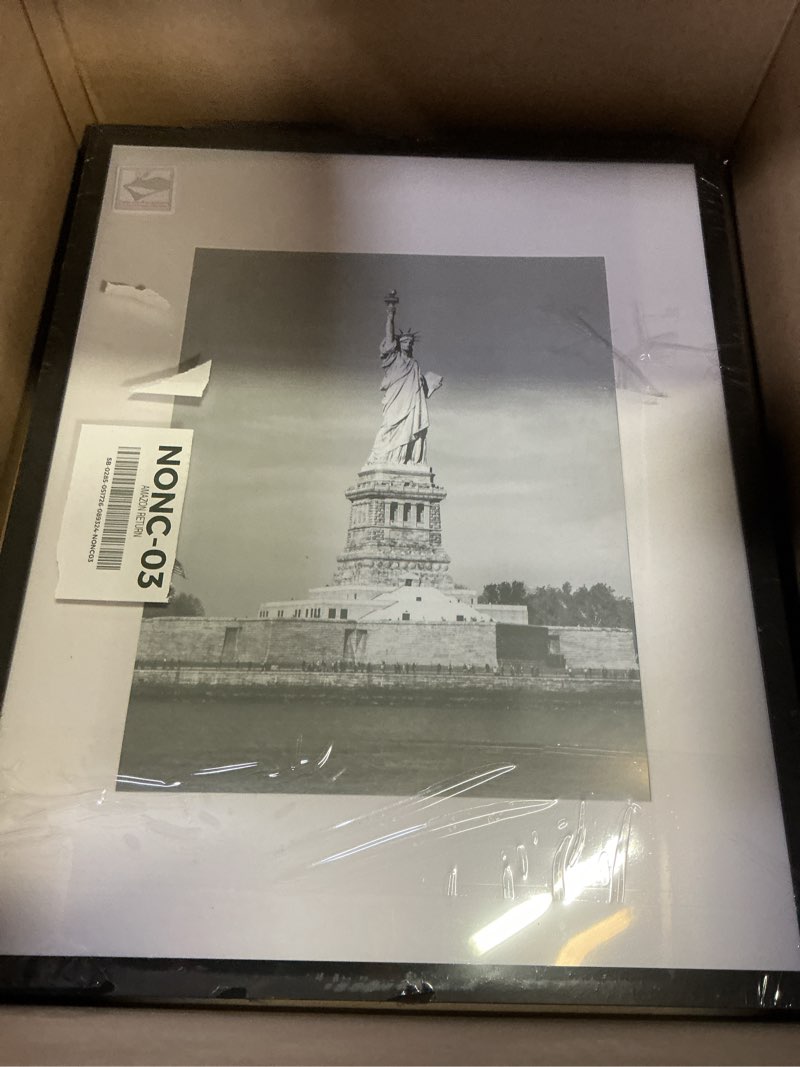 Condition photo showing Good Condition for enjoybasics 16x20 picture frame, display poster 11x14 with mat or 16 x 20 without mat, wall gallery photo frames, black, 2 pack black 16x20