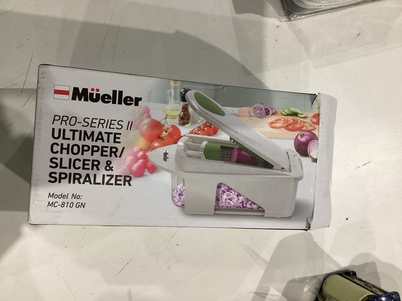 Condition photo showing As Is for mueller pro-series all-in-one, 12 blade mandoline slicer for kitchen, food chopper, vegetable slicer and spiralizer, cutter, dicer, grater, kitchen gadgets sets with container, white sand/pastel green 12 blade white sand and pastel green