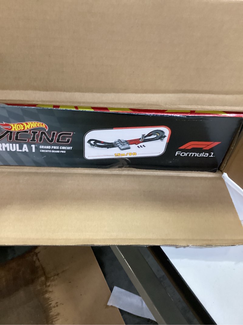 Condition photo showing New/Like New for Hot Wheels Toy Car Track Set, Formula 1 Grand Prix Circuit Track Set with 3 1:64 Scale Die-Cast Toy Cars, Two Modes of Racing with a Motorized Booster