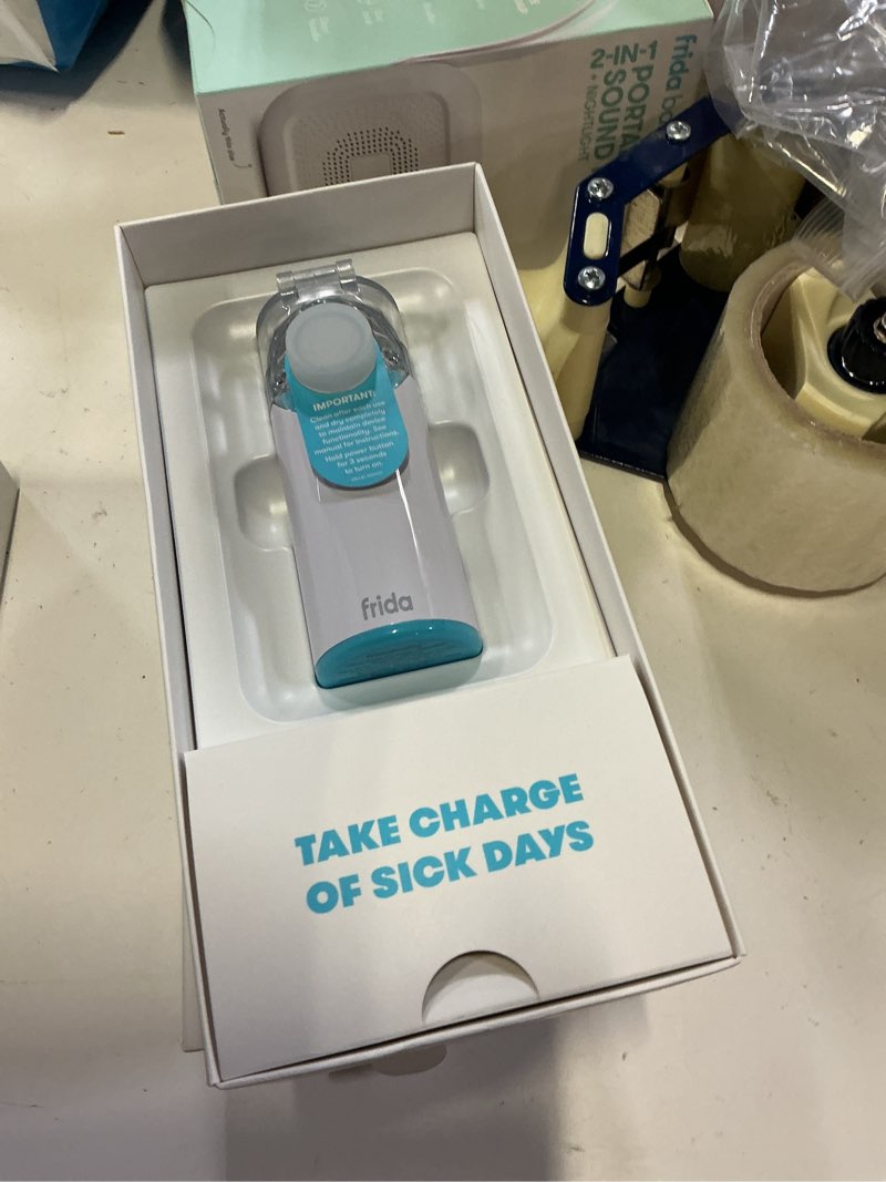 Condition photo showing New/Like New for frida baby ultra-quiet portable nebulizer