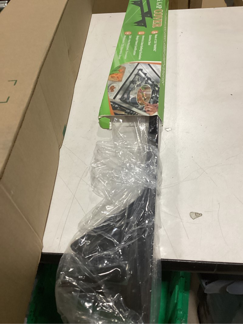 Condition photo showing As Is for Stove Gap Covers Stainless Steel -Length 23.4" Width 0.79",Stove Gap Filler, Oven Gap Filler, Oven Side Gap Filler, Range Trim Kit, Heat Resistant and Easy to Clean, Black(2PCS) 23.4 Black-Thickened
