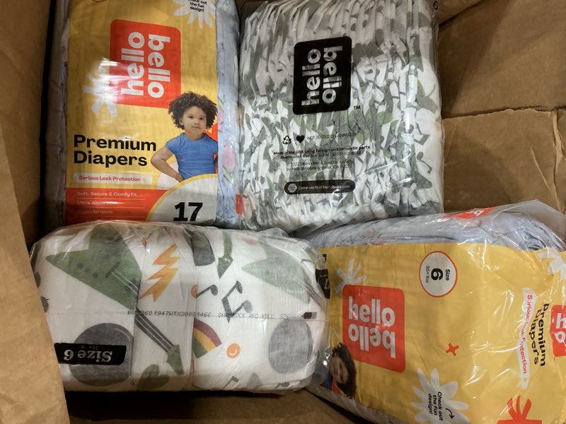 Condition photo showing As Is for hello bello premium diapers size 6, celestial cuties & daring doodlers designs, 42ct club box size 6 celestial cuties & daring doodlers
