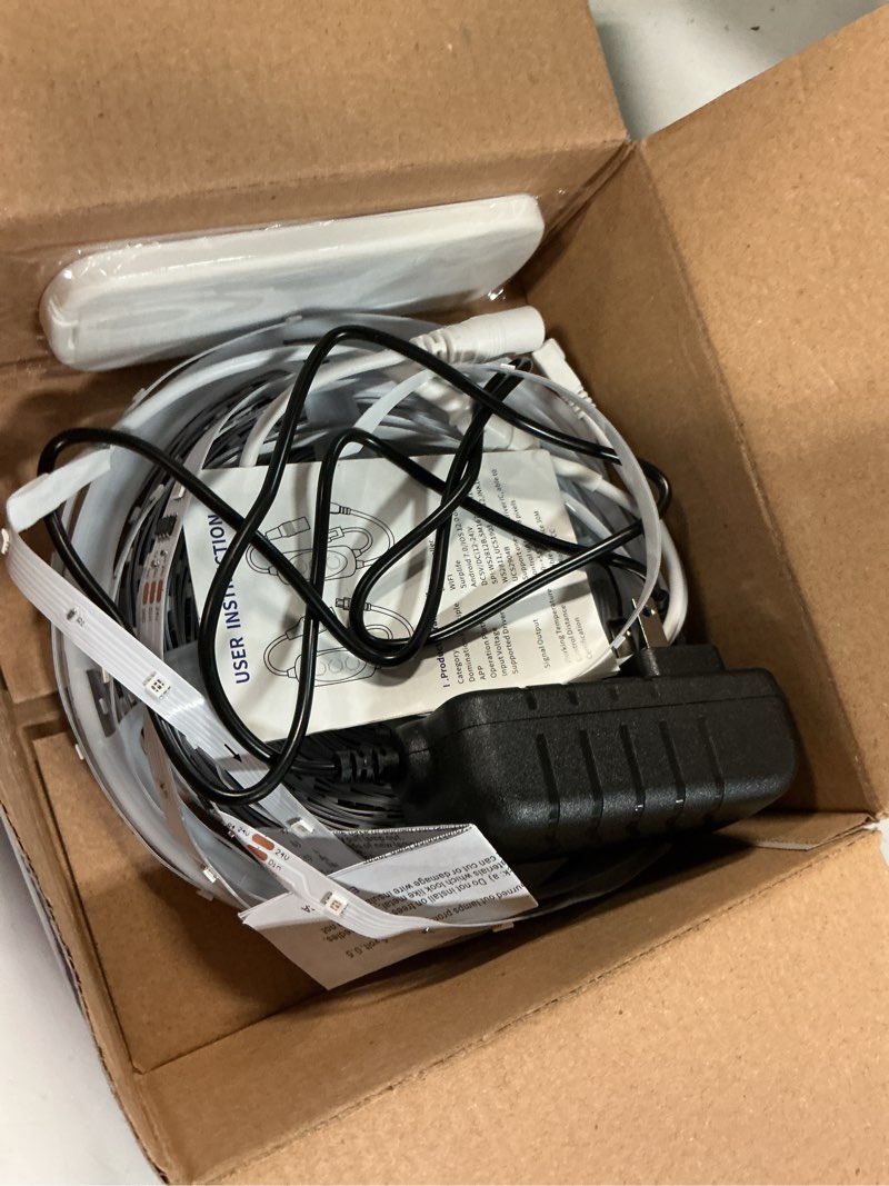 Condition photo showing As Is for Smart IC RGB LED Strip Lights 50FT, Segmented DIY Color Changing, Rainbow Chasing Effects, WiFi App/Voice Control, Music Sync, Works with Alexa & Google Assistant, LED Lights for Bedroom Decor