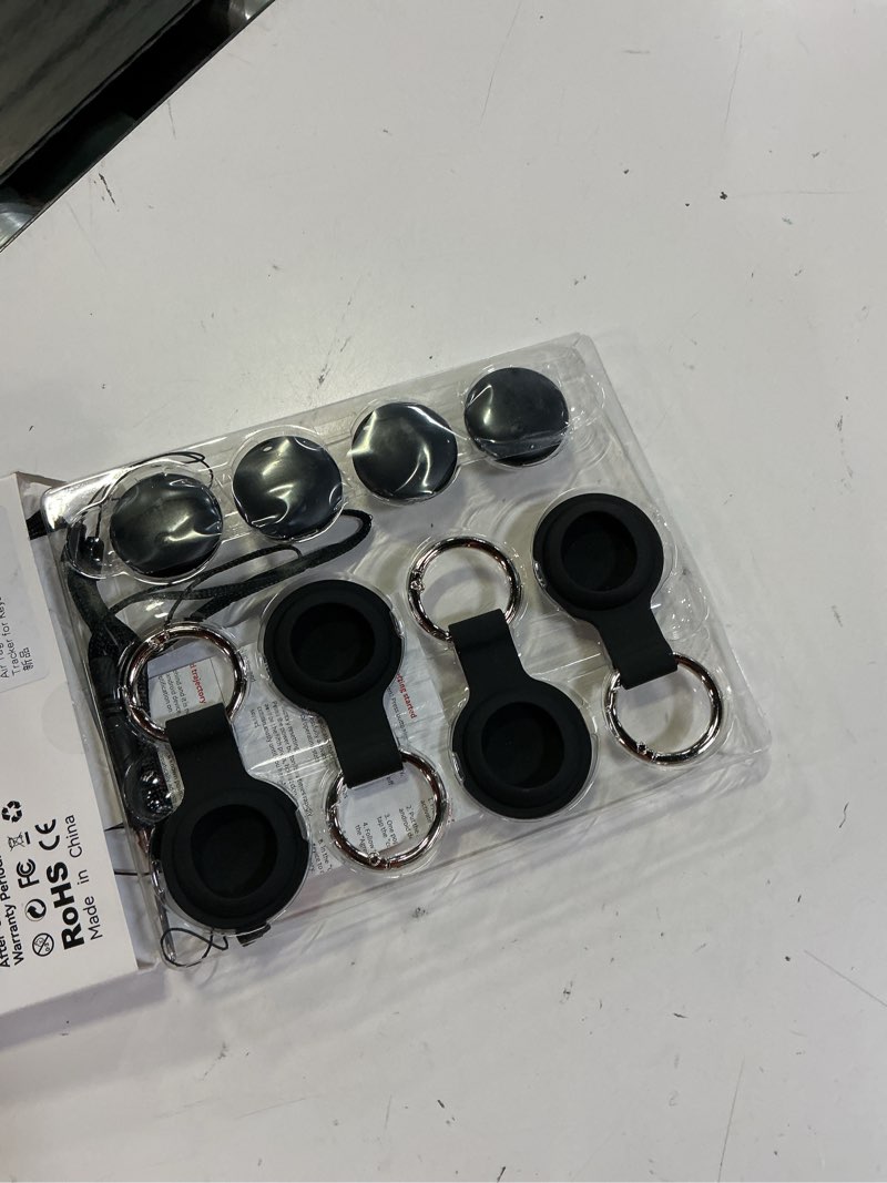 Condition photo showing New/Like New for air tags for android,air tags-4 pack android,2 year battery life,air tracker tags with 4 case,google find trackers for google's find hub app,ip65 waterproof luggage tracker for keys black