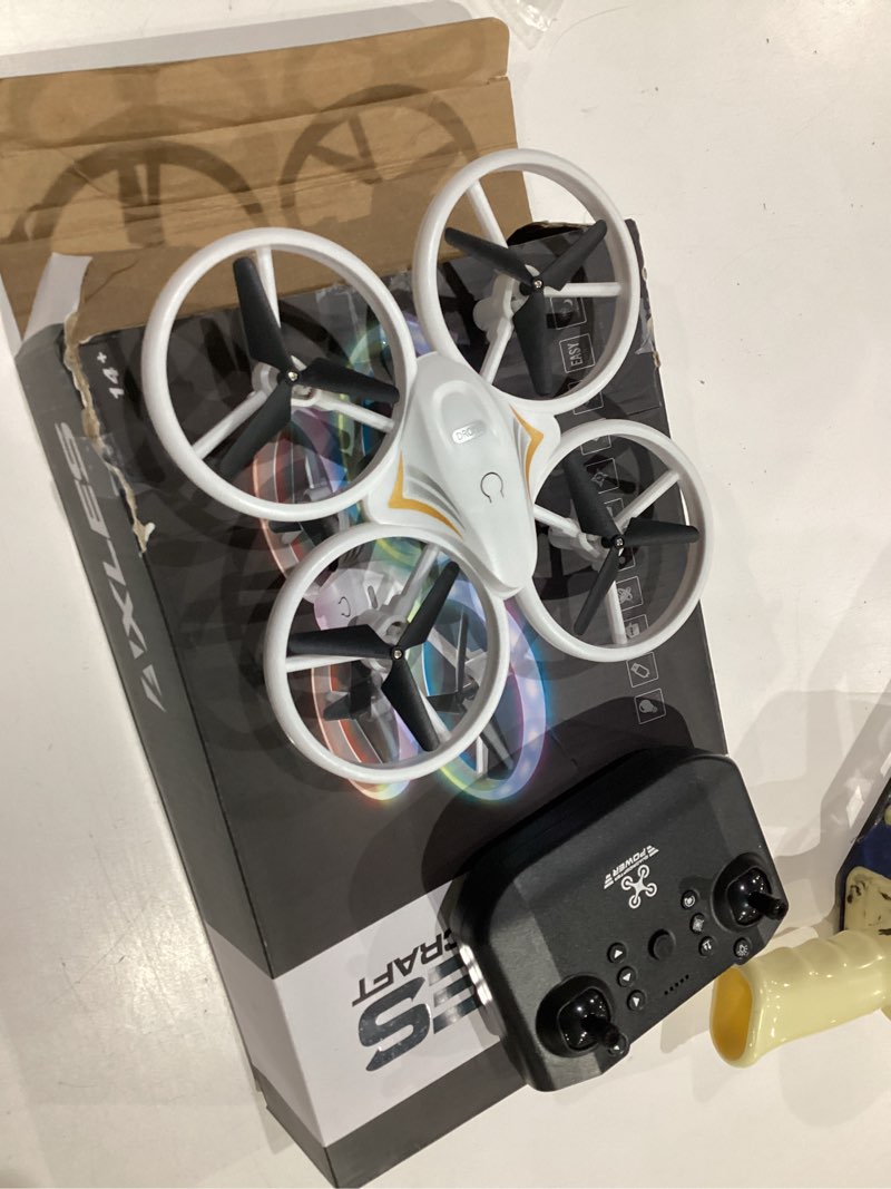 Condition photo showing As Is for drones for kids, rc drone with cool led lights mini remote control beginner drone indoor outdoor rc quadcopter with 3d flip and 2 rechargeable battery flying toys gift for boys girls, white