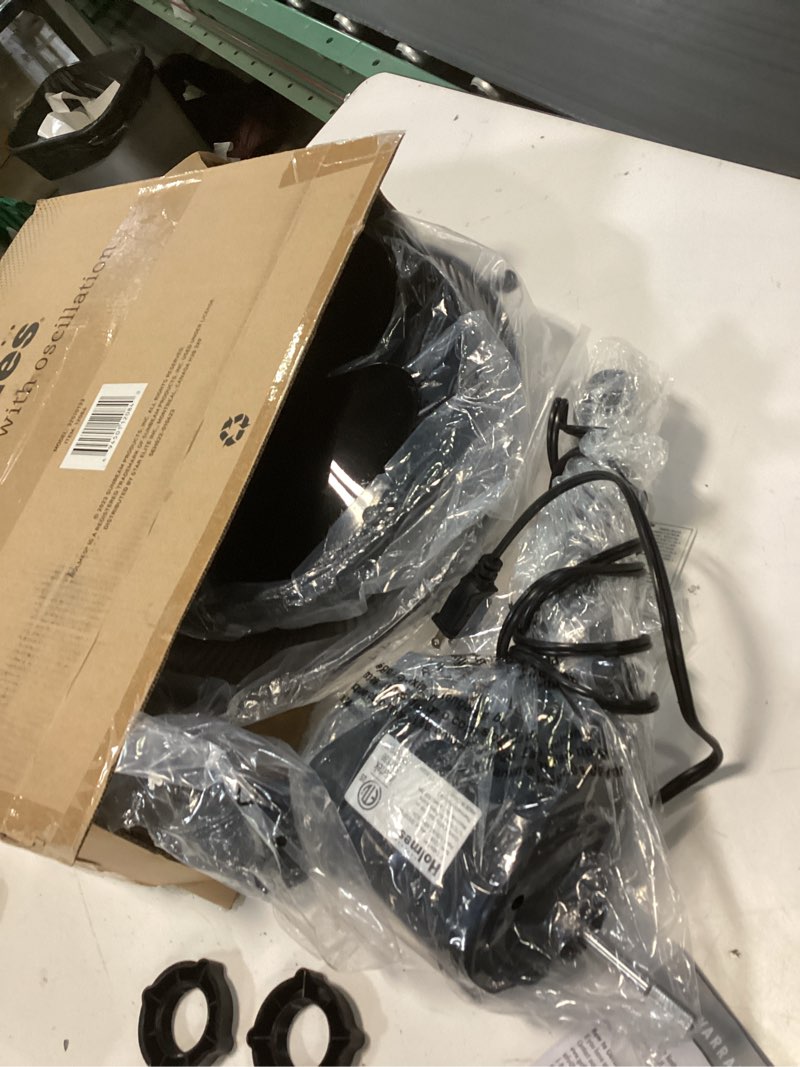 Condition photo showing New/Like New for HOLMES 12" Table Fan, 75° Oscillation, 3 Speeds, 15° Adjustable Head Tilt, Ideal for Home, Bedroom or Office, Black