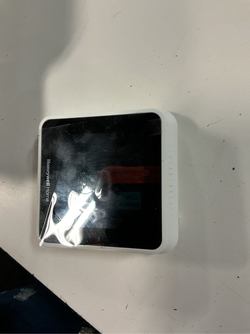 Condition photo showing As Is for t5 7-day smart wi-fi programmable thermostat with geofence technology
