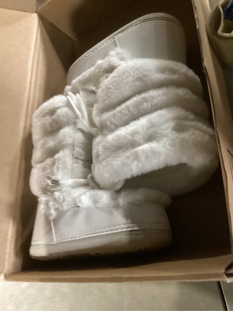 Condition photo showing New/Like New for Faux Fur Boots for Women - Fuzzy Fluffy Furry Water Resistant Snow Boots for Women - Anti-Slip with Cotton Sponge Lined and TPR Rubber Sole Black White Fur Boots 8-9 White