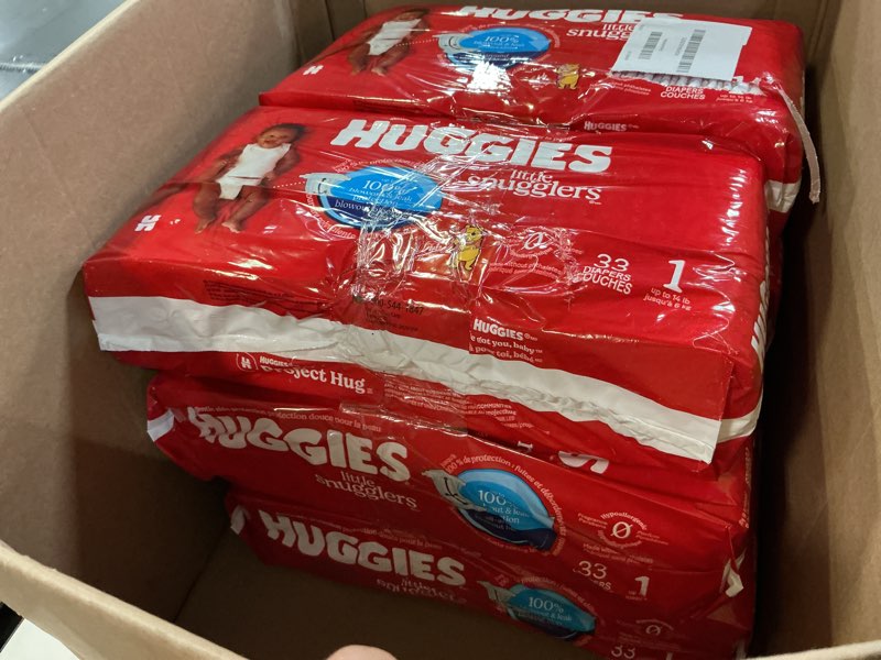 Condition photo showing Good Condition for Huggies Size 1 Diapers, Little Snugglers Diapers, Size 1 (8-14 lbs), 198 Count (6 Packs of 33), Packaging May Vary Size 1 198