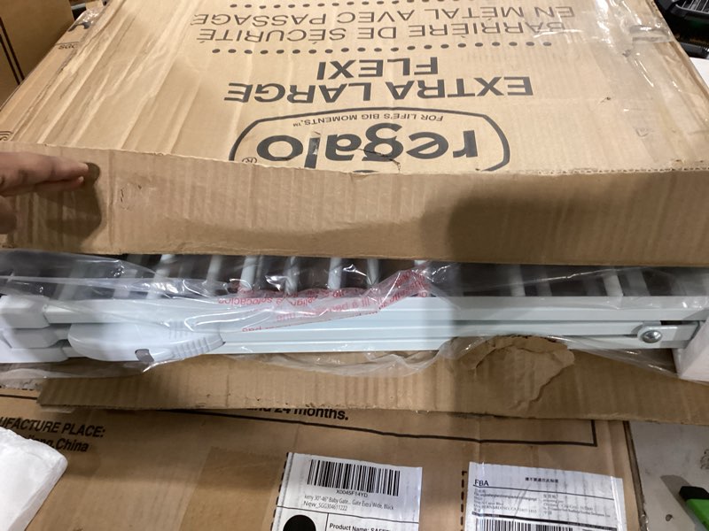 Condition photo showing Good Condition for regalo safety 28"-76” super wide configurable baby gate for doorways & open spaces, 3-panel wall mounted safety gate with door for babies, toddlers & pets, includes wall mount hardware 28-76"w x 30"h white
