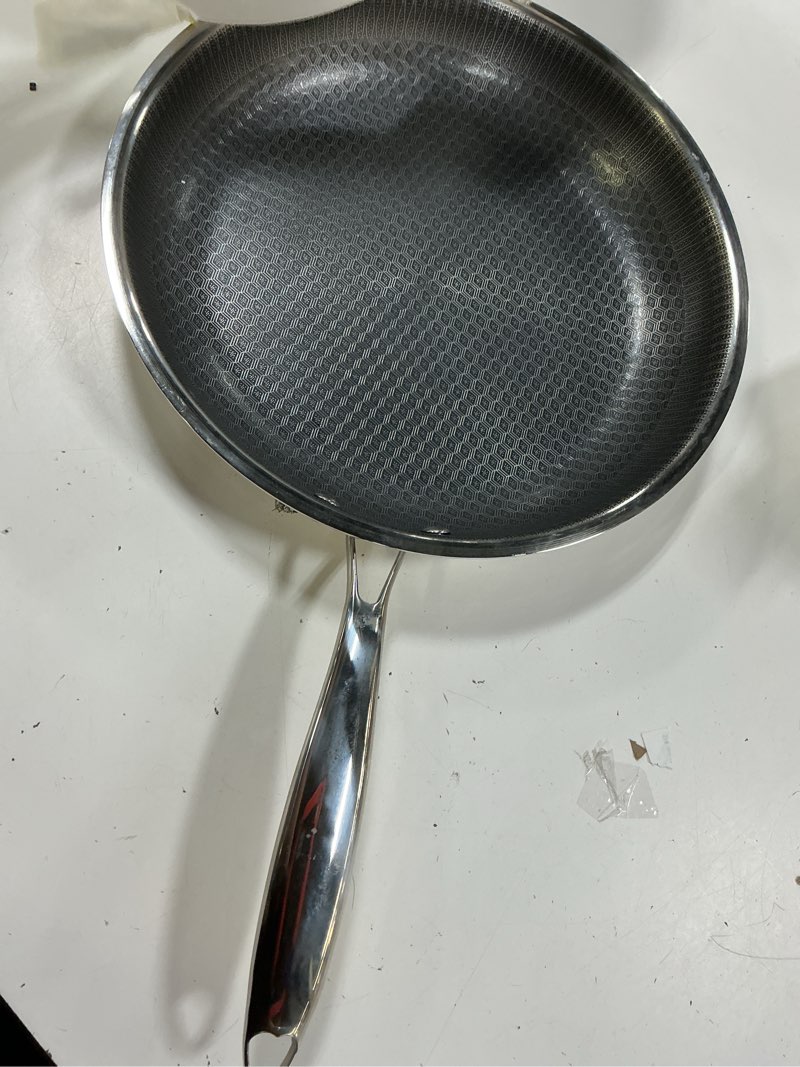 Condition photo showing As Is for mainstays 12" tri ply hybrid skillet with stainless steel handle