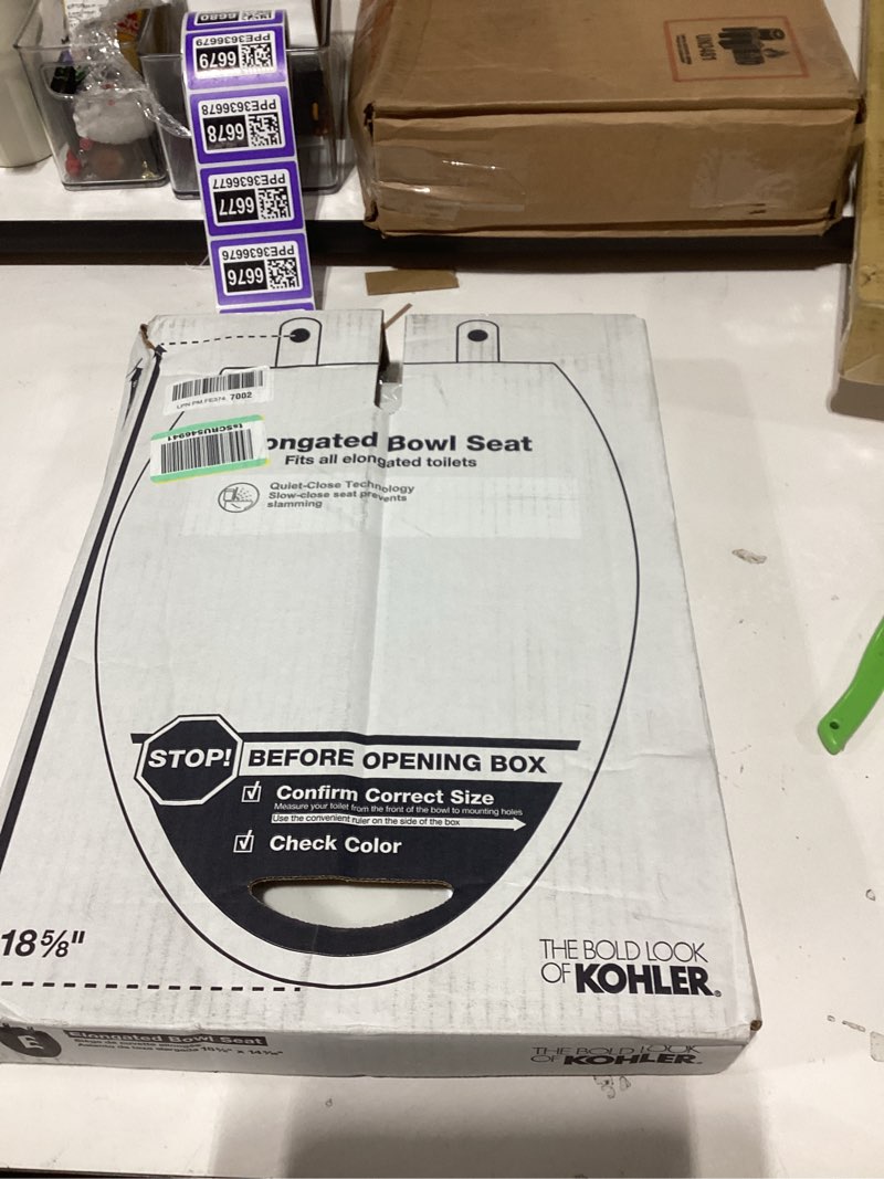 Condition photo showing Good Condition for Kohler K-20110-0 Brevia Elongated Toilet Seat with Grip-Tight Bumpers, Quiet-Close Seat, Quick-Attach Hardware, White