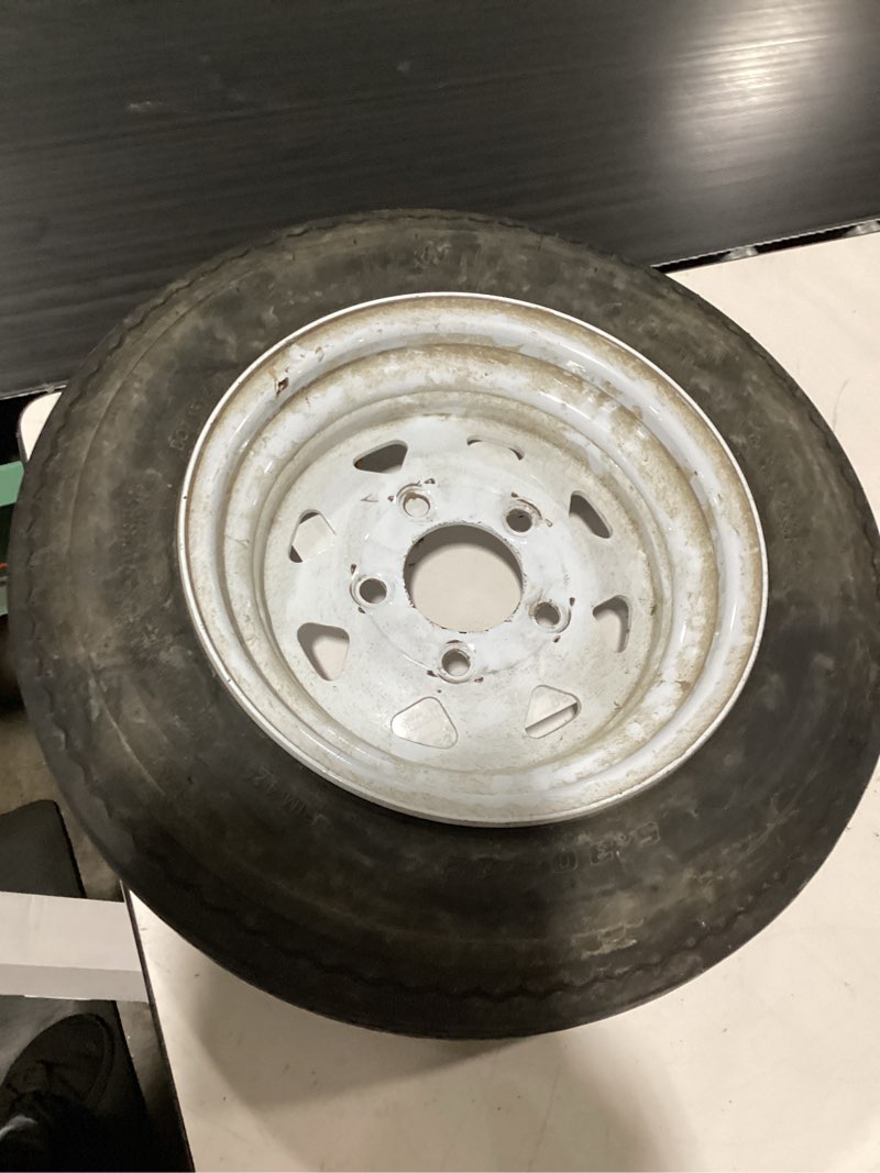 Condition photo showing As Is for hi-run trailer tire, 530x12-6, 5-hole, load range c, asb1047