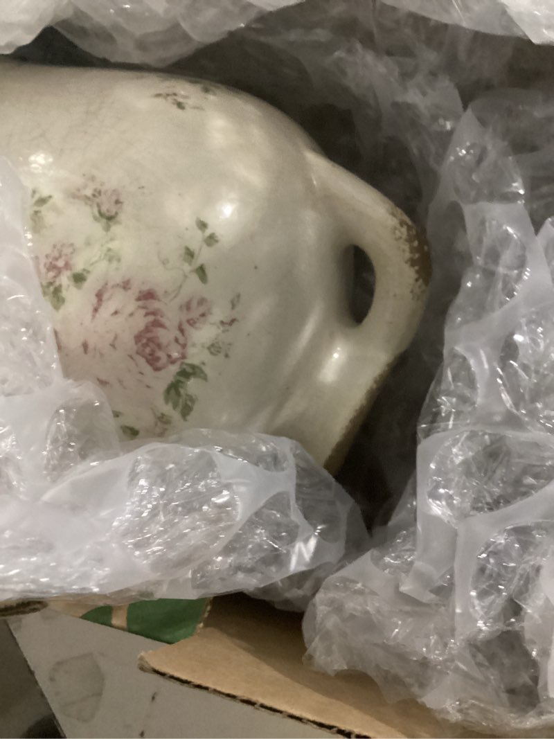 Condition photo showing New/Like New for 8in. tuscan ceramic floral print vase