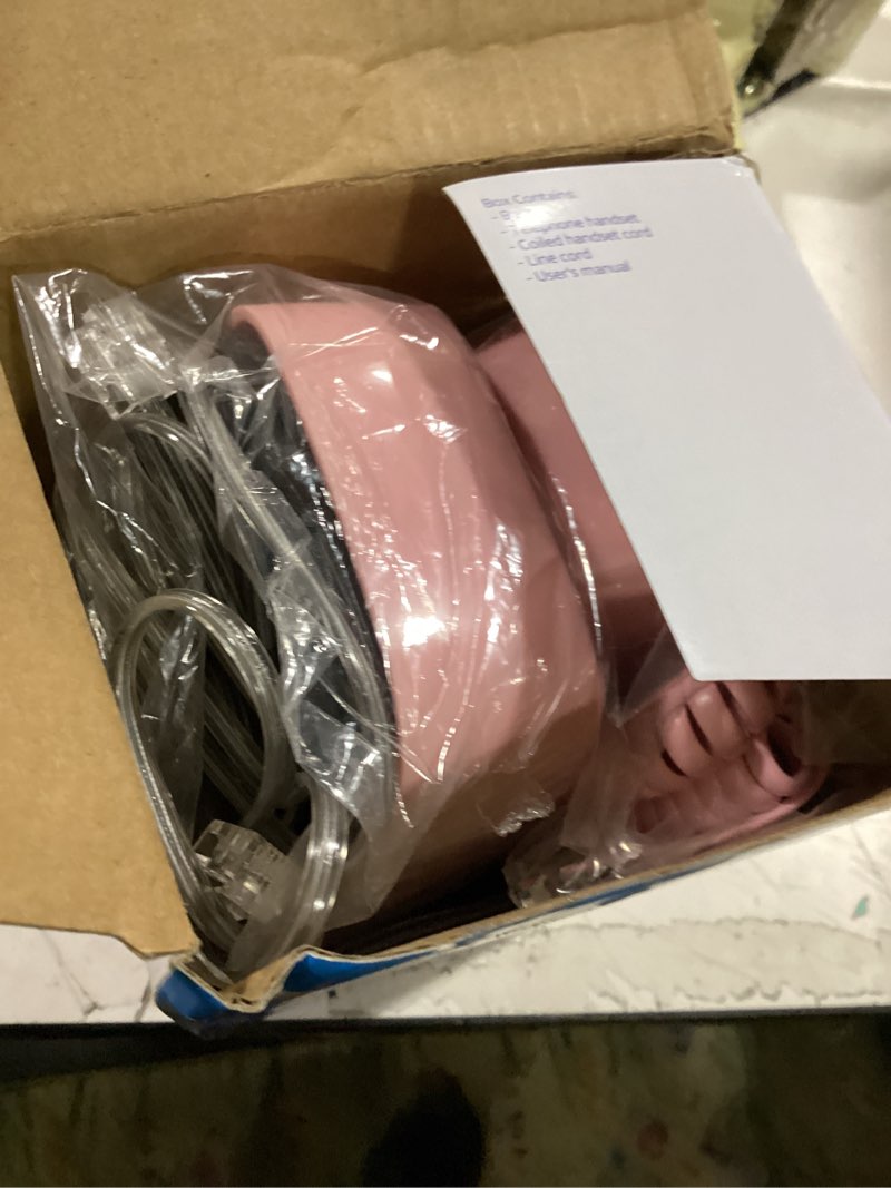 Condition photo showing Good Condition for at&t trimline 210 corded home phone, no ac power required, improved easy-wall-mount, lighted big button keypad, 13 speeddial keys, last number redial, mute, flash, volume control, princess phone, pink
